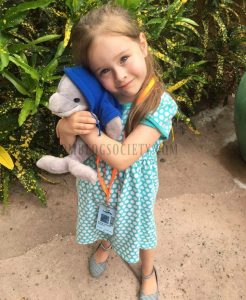 emma holding her dolphin-mbs
