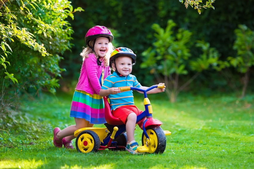 Two children riding bikes